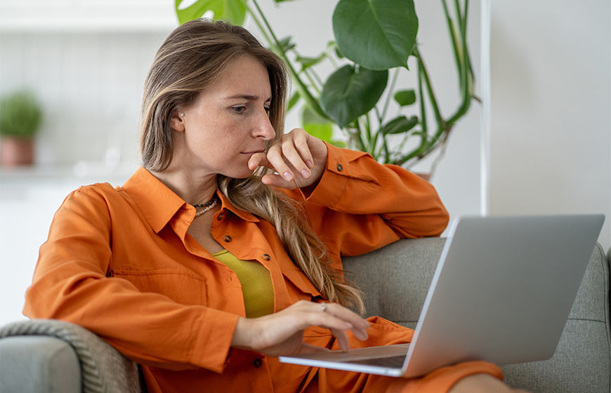 Photo of a woman using a laptop