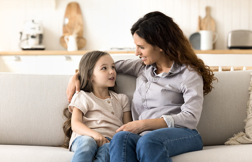 Photo of a mother talking to her daughter