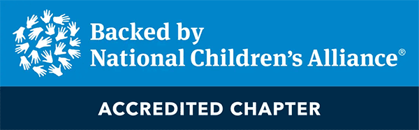 NCA Accredited Chapter seal with white serif type and hand icons over blue background